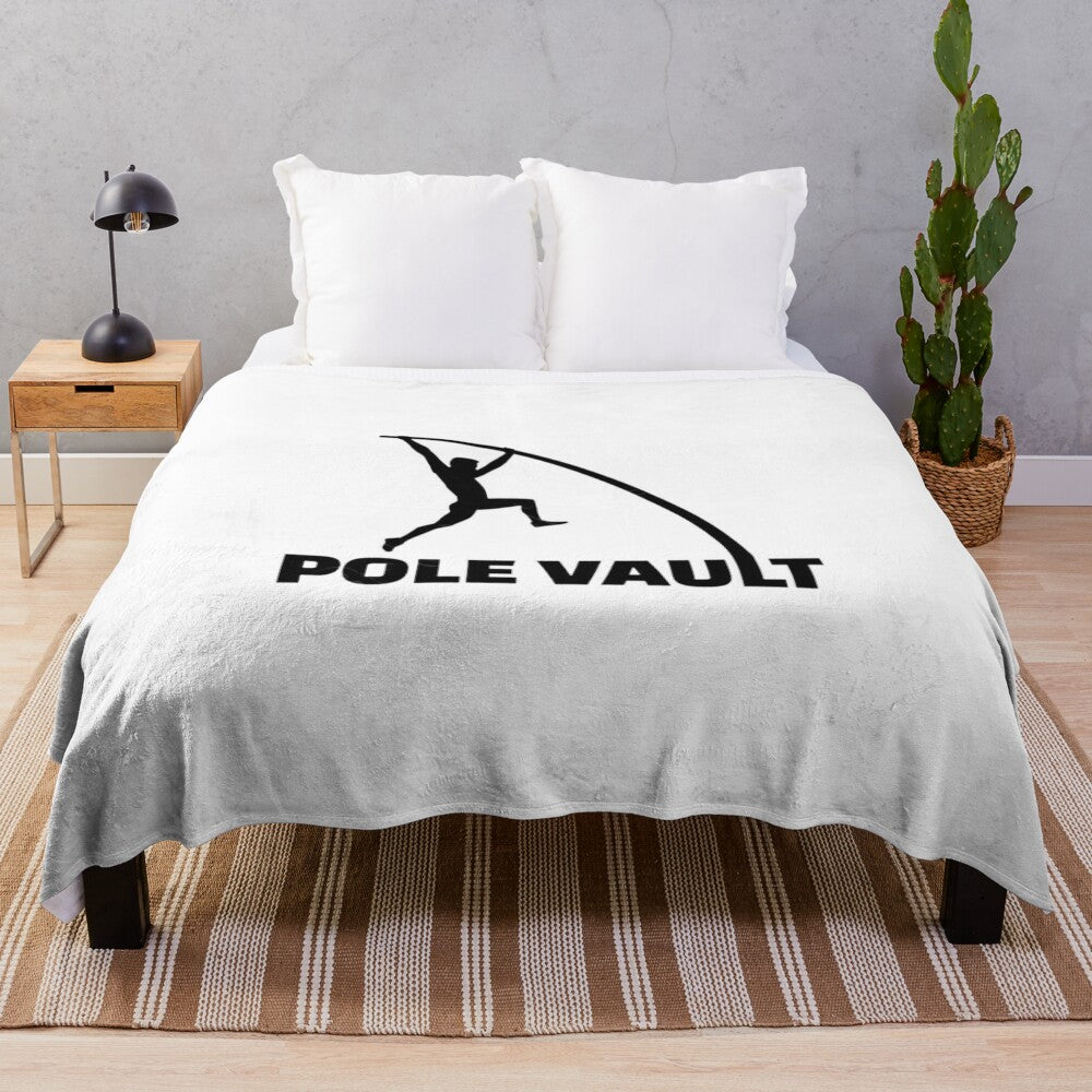 Plush blanket featuring pole vault athlete and equipment