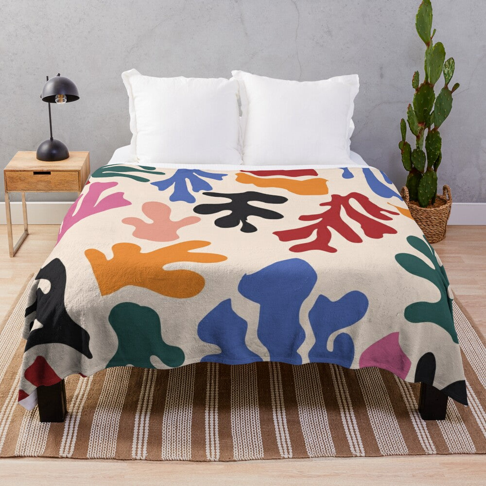 Matisse-inspired plush blanket with vibrant abstract patterns