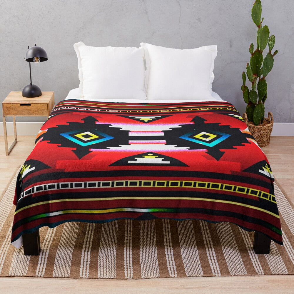 Teal plush blanket with tribal pattern and native american inspired geometric design