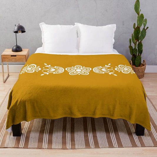 Vintage-inspired plush blanket featuring Pyrex Butterfly Gold design