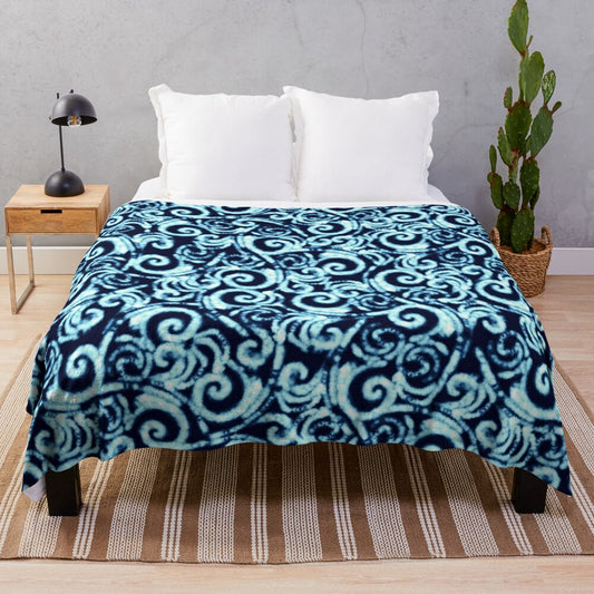 Plush blue winter blanket with abstract watercolor pattern