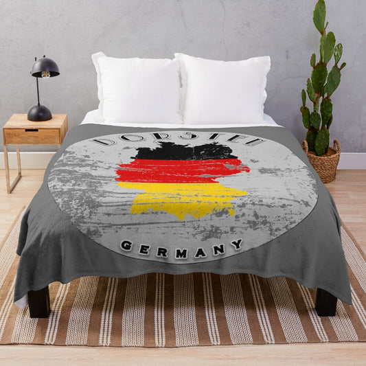 Vintage-style plush blanket featuring the German flag design for cozy home decor