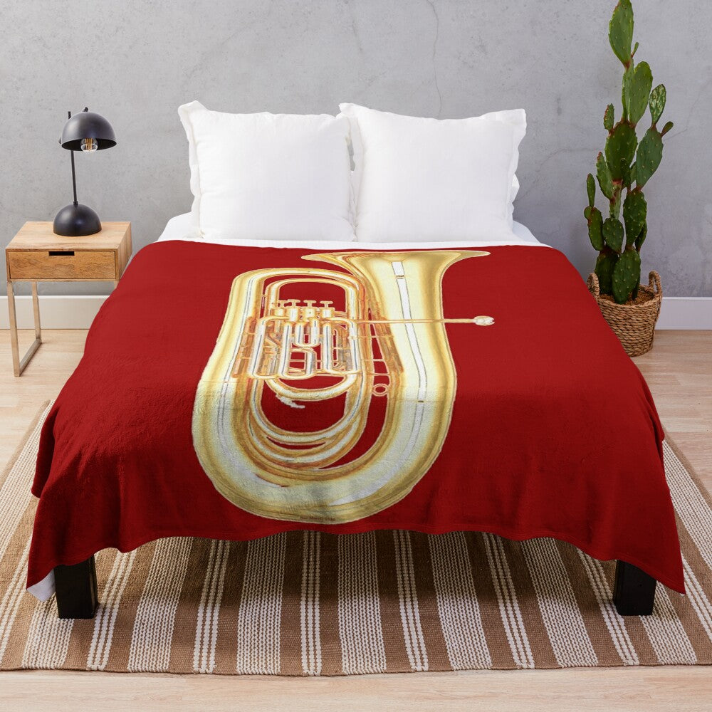 Cozy plush blanket featuring a tuba design, great for music enthusiasts