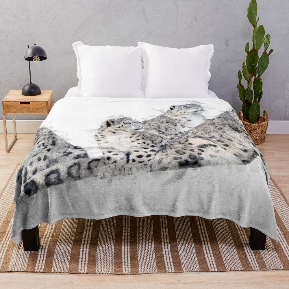 Soft and cozy plush blanket featuring a beautiful watercolor snow leopard design