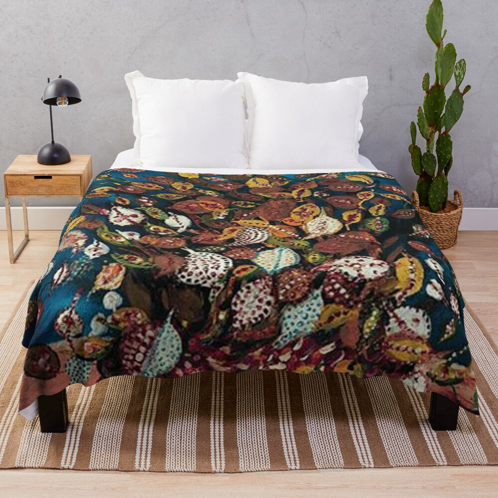 Plush blanket with a vibrant bouquet of leaves design inspired by the French artist Seraphine Louis