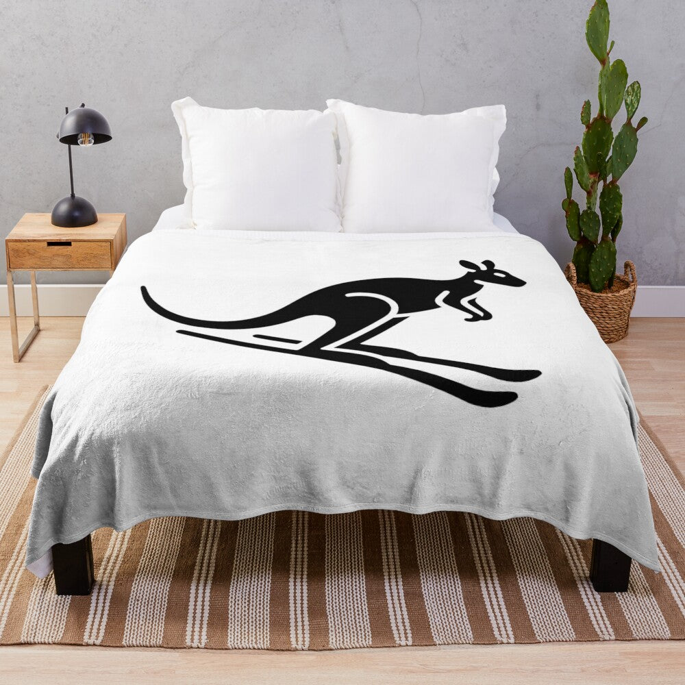 Black and white kangaroo skiing graphic on a plush blanket