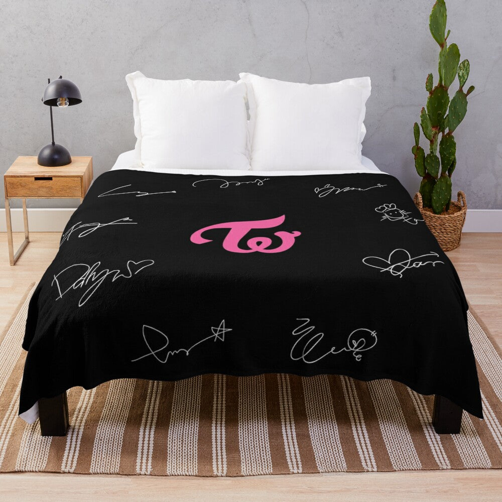 Twice-inspired plush blanket with autograph design in white