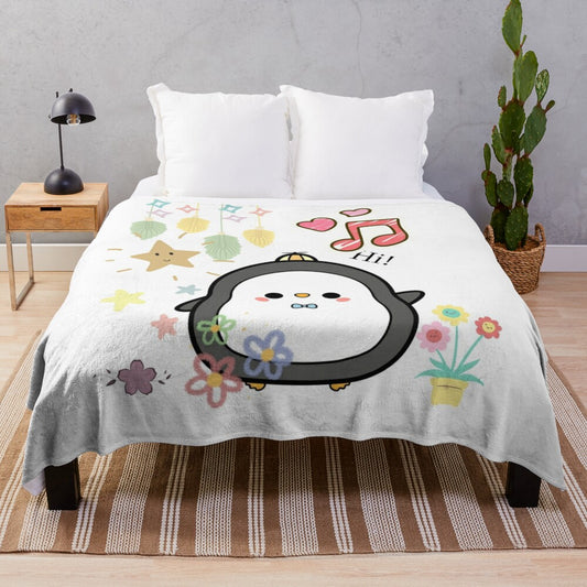 Soft and cozy penguin plush blanket with musical notes and floral design