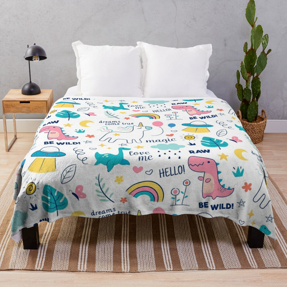 Plush blanket featuring a doodle-style design of cute mythical animals like unicorns and dragons