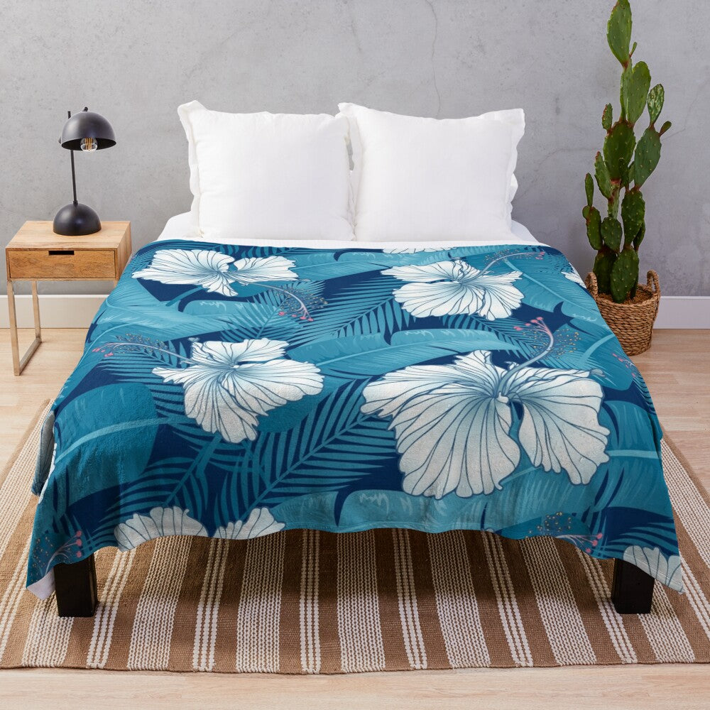 Vibrant hibiscus graphic pattern on a plush blanket