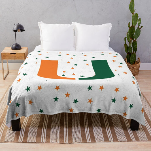 University of Miami Hurricanes logo on a plush orange and green blanket