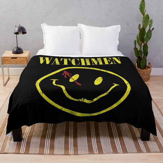 Watchmen-inspired plush blanket featuring iconic smiley face logo and comic book elements