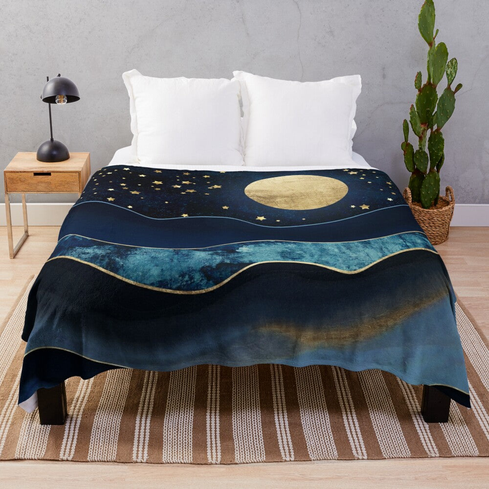 Cozy plush blanket with golden moon and starry night design