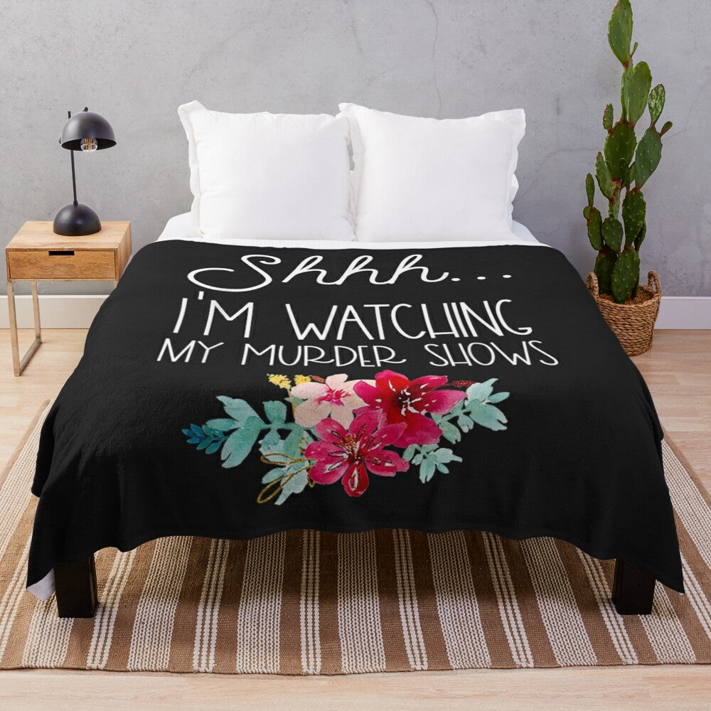 Plush blanket with "Shhh, I'm Watching My Murder Shows" text for true crime fans