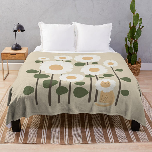 Plush blanket featuring a whimsical cat and plant floral design