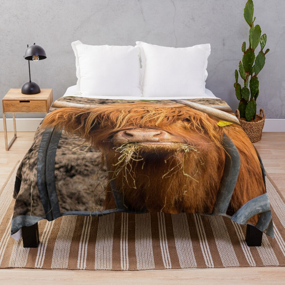 Cozy plush blanket featuring a cute, furry Scottish Highland cow in a ginger color