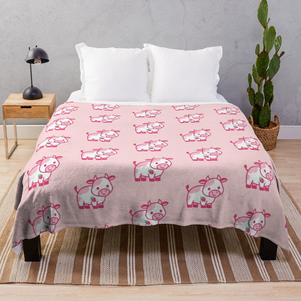 Soft and snuggly strawberry cow plush blanket