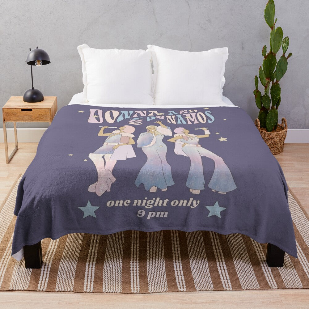 70s-inspired plush blanket with Donna and the Dynamos design