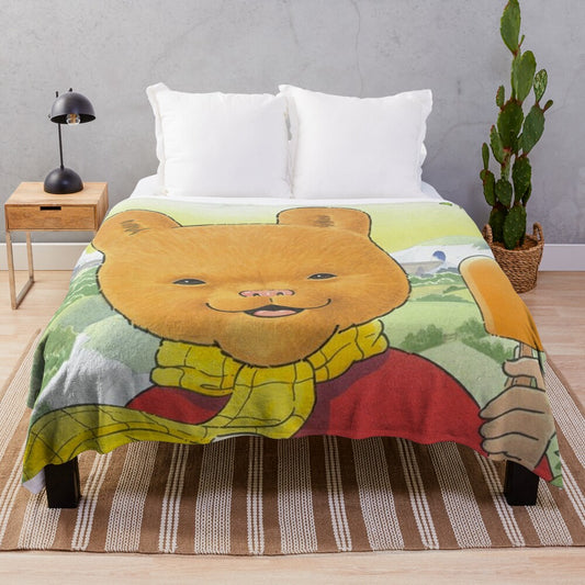 Vintage-style Rupert Bear plush blanket with classic cartoon design