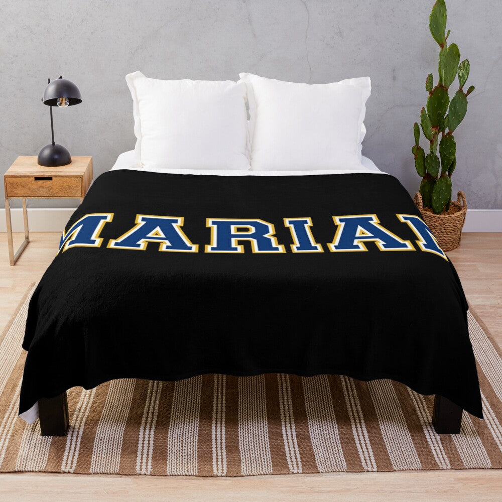 Marian University-inspired plush blanket in blue and gold