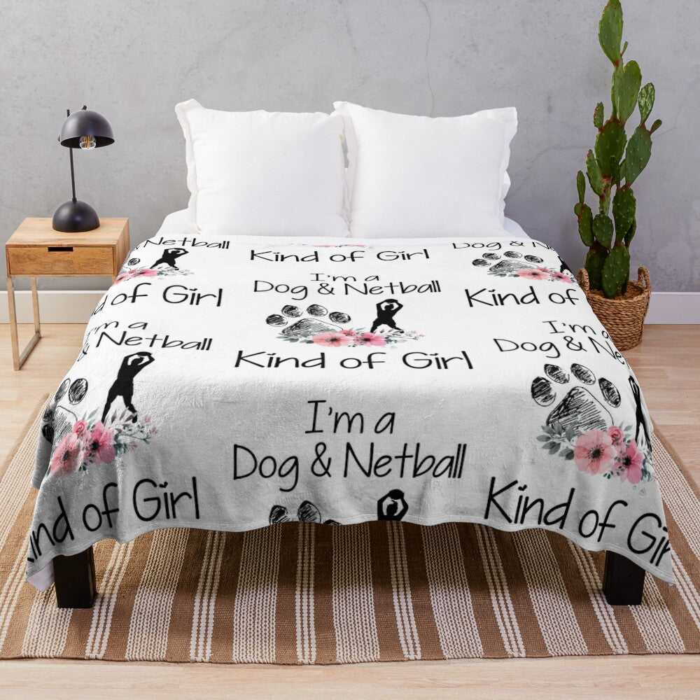 Plush blanket with "I'm a Dog and Netball kind of girl" design for netball fans and sports lovers