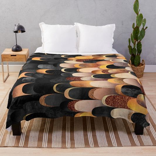 Copper and black plush blanket with abstract feathered pattern