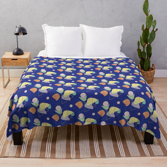 Plush blanket with blue and purple floral pattern