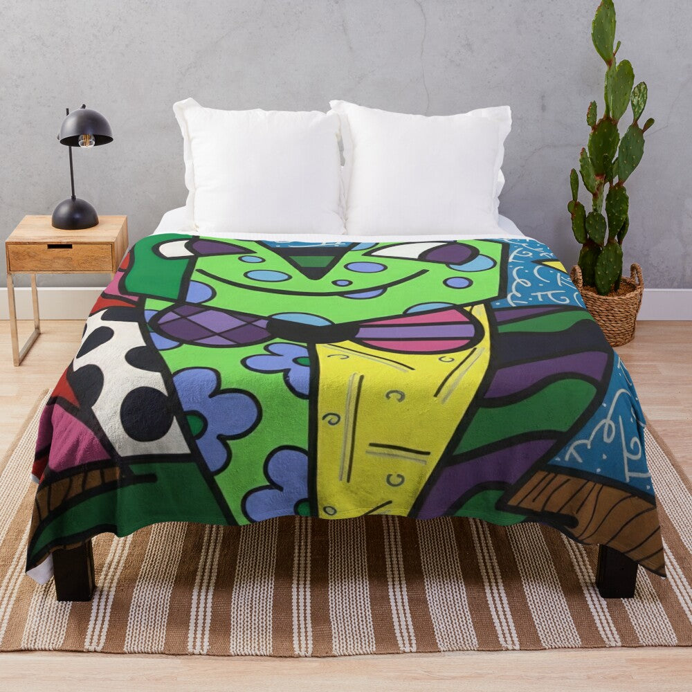 Romero Britto inspired plush blanket with bold, colorful patterns