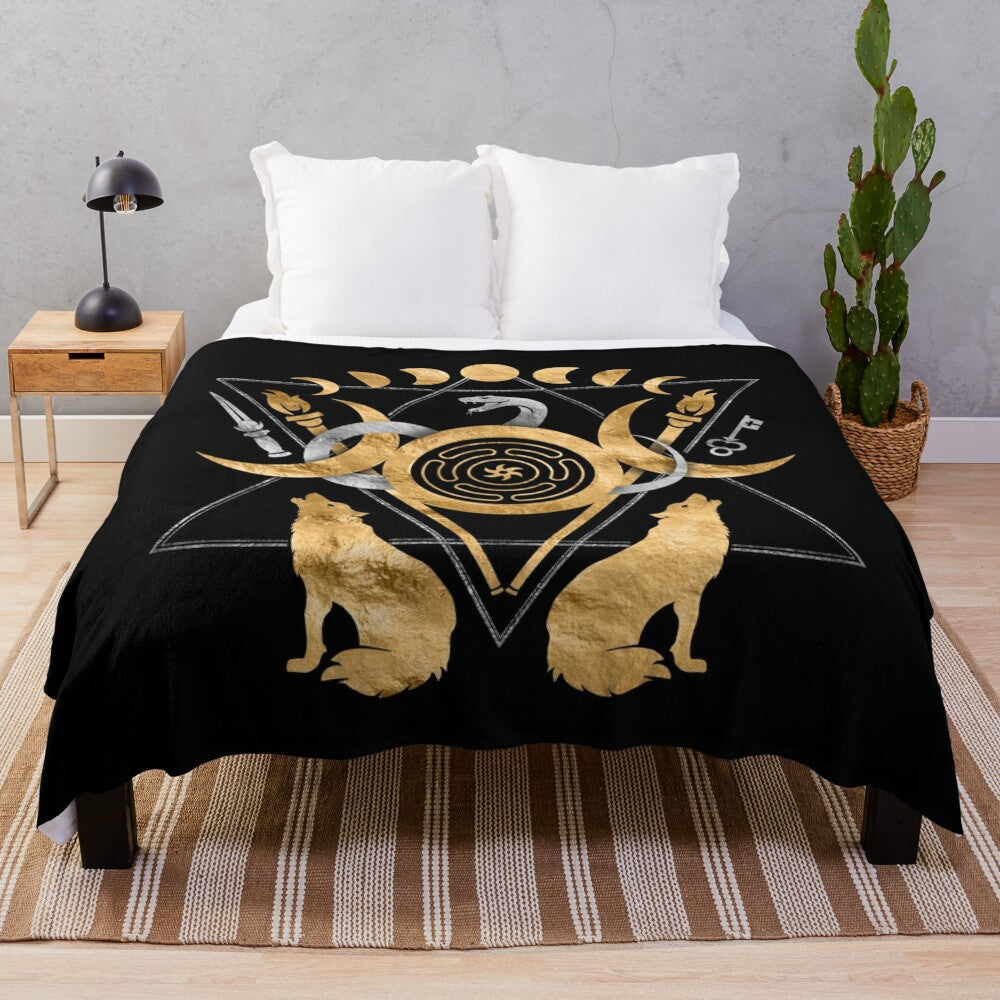 Plush blanket featuring the symbols of the Greek goddess Hecate, including the wheel, torches, and triple moon.