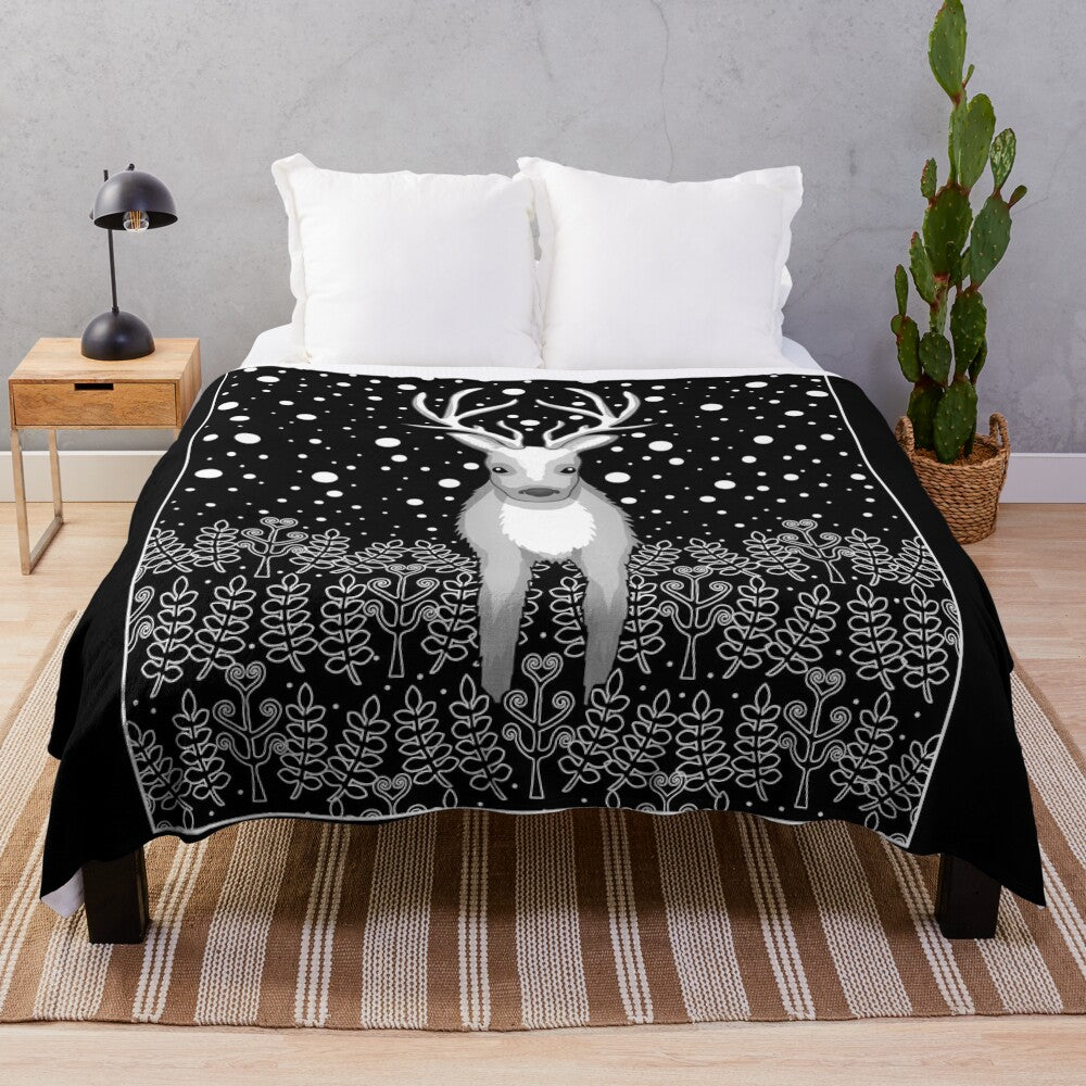 Cozy plush blanket featuring a deer, reindeer, and elk design