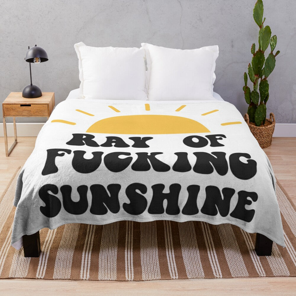 Retro-inspired plush blanket with "Ray of Sunshine" slogan design