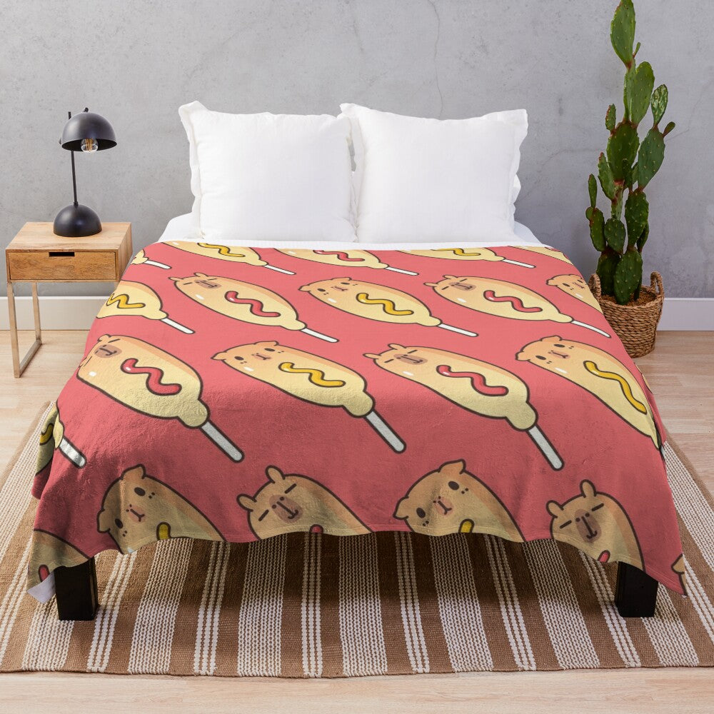 Red plush blanket with a corn dog pattern, featuring cute guinea pigs and capybaras