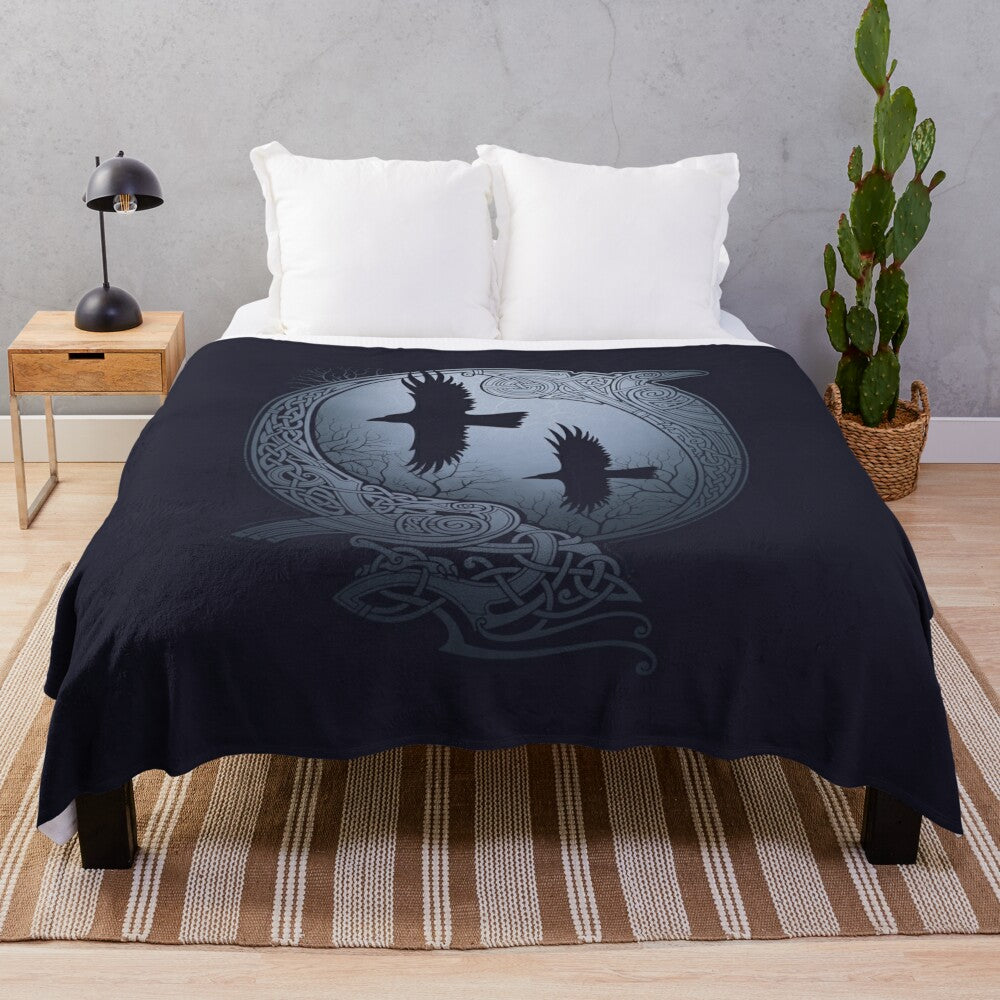 Plush blanket featuring raven design inspired by Nordic mythology