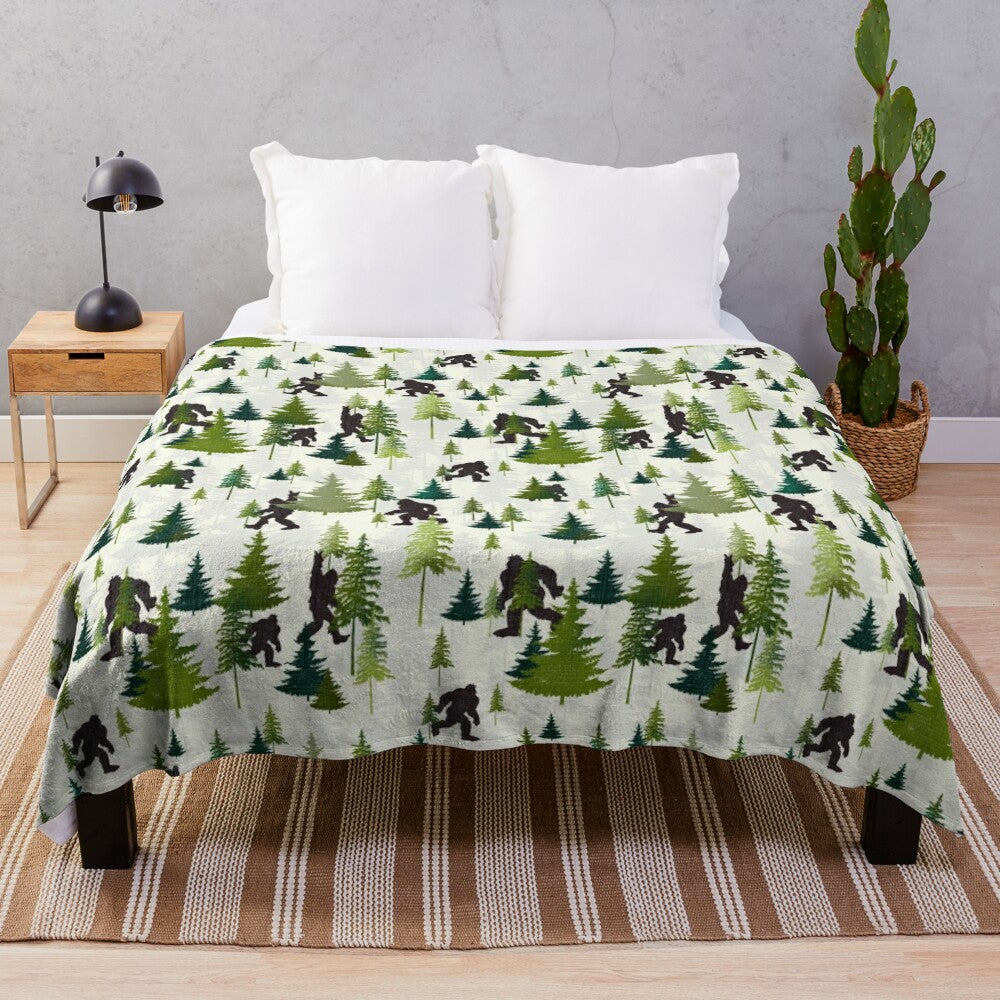 A plush blanket featuring a Bigfoot design, perfect for outdoor adventures and nature enthusiasts.