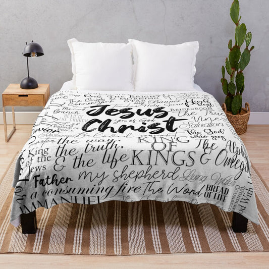 Plush blanket featuring the names of God in Christian inspired calligraphy and typography