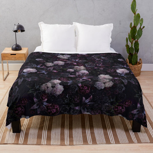 Luxurious dark floral plush blanket with a midnight black and rose design