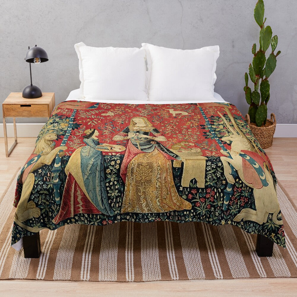 Plush blanket featuring a mystical unicorn design inspired by the medieval tapestry "The Lady and the Unicorn"