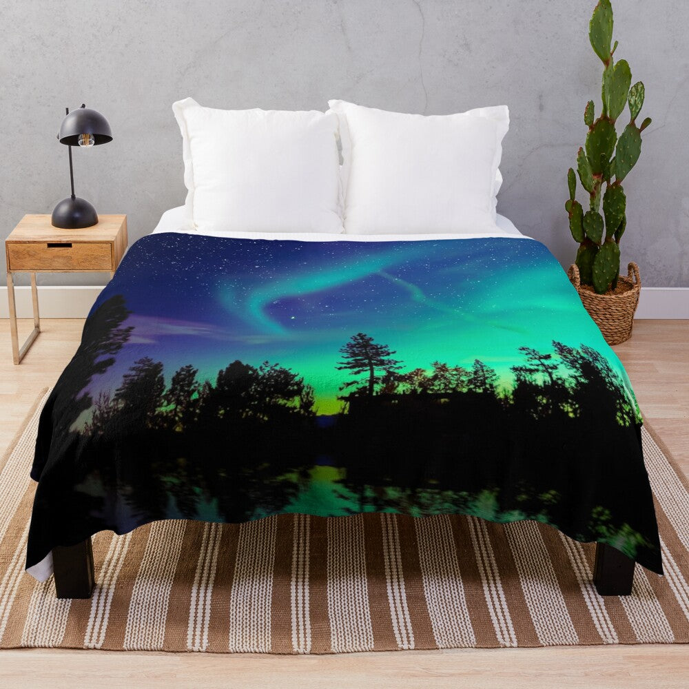 A cozy plush blanket with a stunning northern lights design