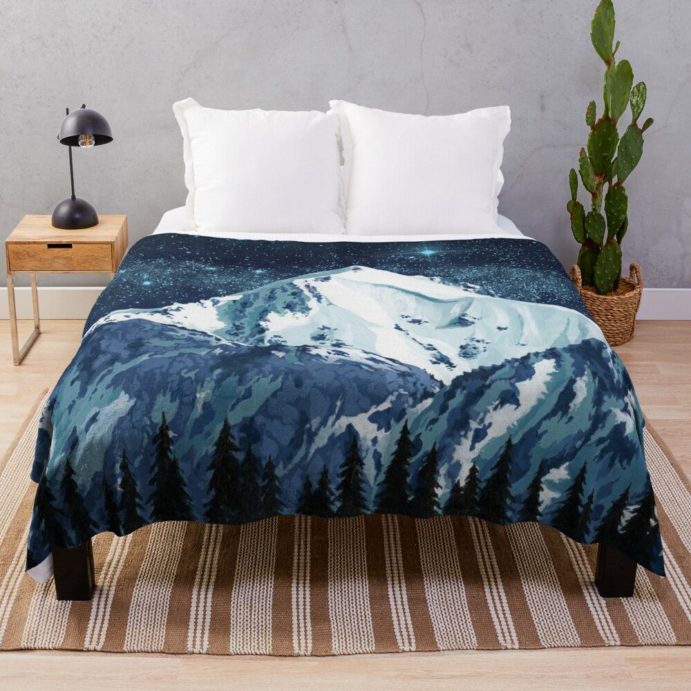 Plush blanket featuring a starry night sky over a snowy mountain landscape