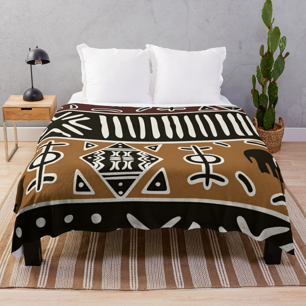 Soft plush blanket with tribal African mud cloth pattern and elephant design