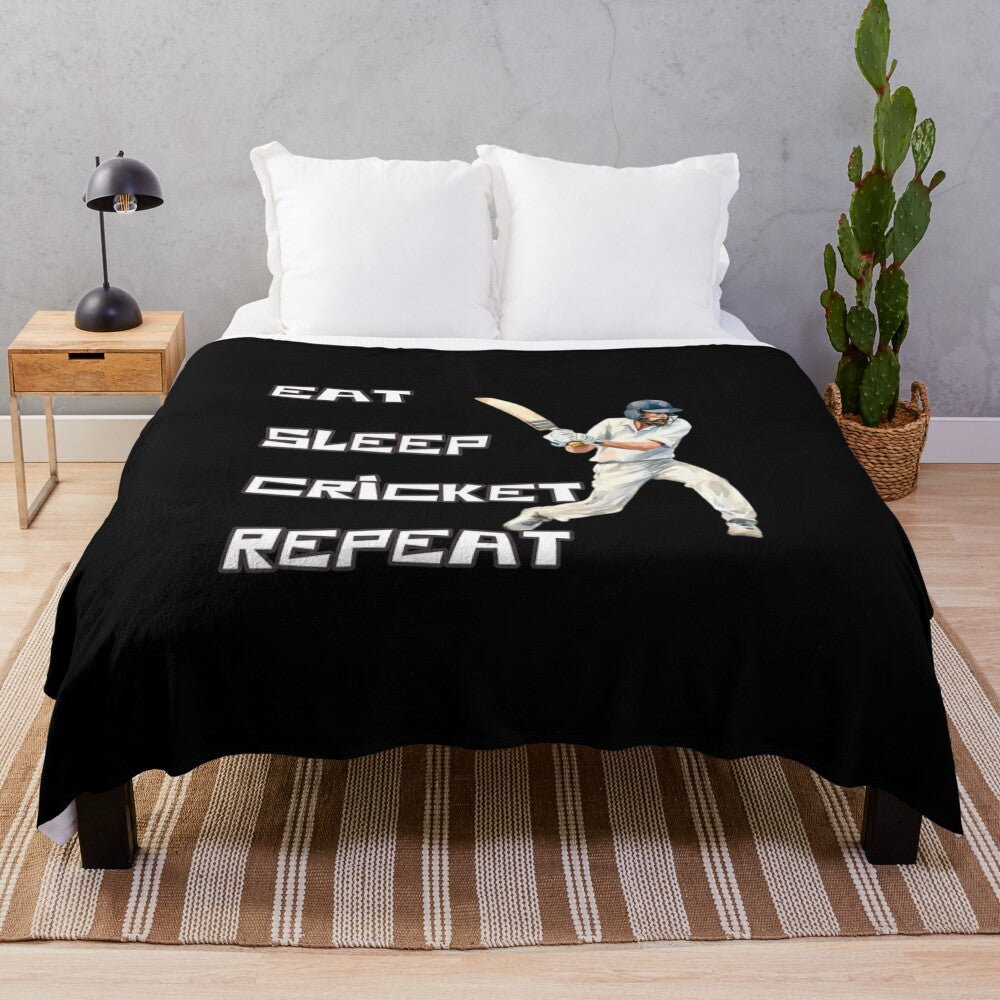 Soft plush blanket with "Eat Sleep Cricket Repeat" pattern for cricket fans