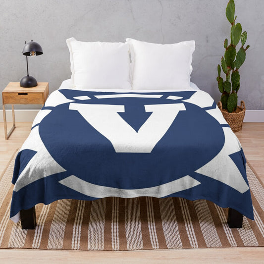 Soft and cozy plush blanket featuring a winged superhero insignia with the letter V