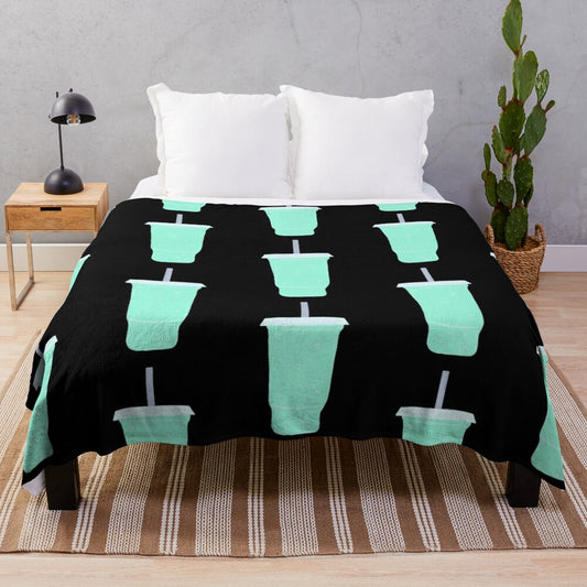 Teal plush blanket with Baja Blast soda inspired design