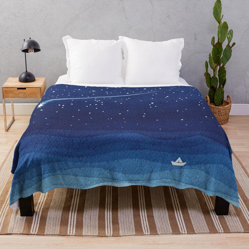 Watercolor-style plush blanket featuring a sailboat on a night sea with shooting stars