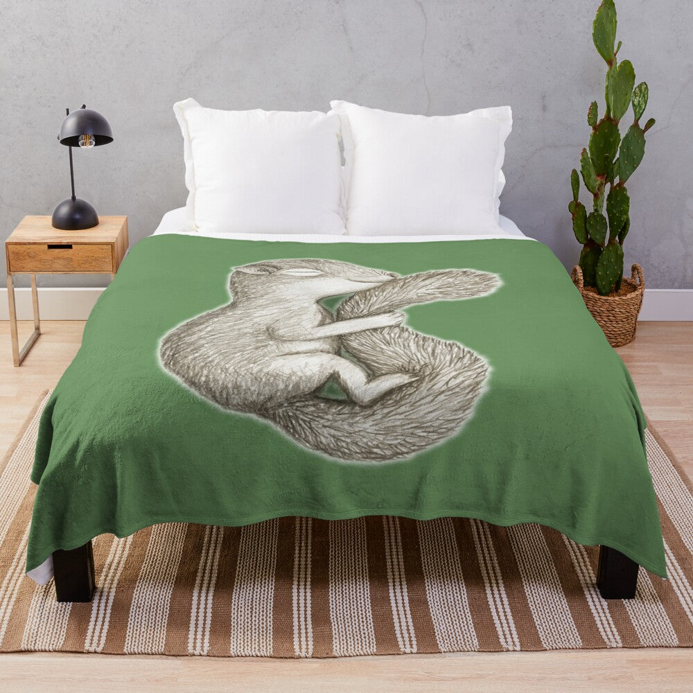 Soft and warm plush blanket with a sleeping squirrel design