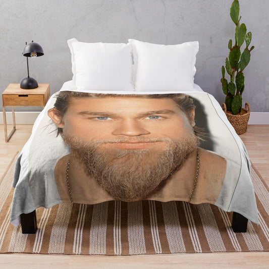 Charlie Hunnam, the handsome actor, featured on a plush blanket