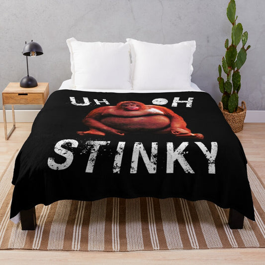 Monke meme-inspired plush blanket featuring humorous "Uh oh, stinky" design