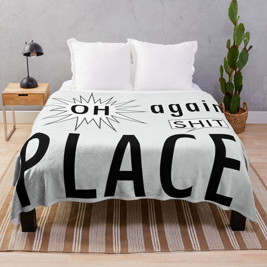 Plush blanket with "Shit Place Office" text, a humorous office-themed design