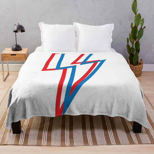 Ziggy Stardust-inspired plush blanket with bold red and blue graphic pattern