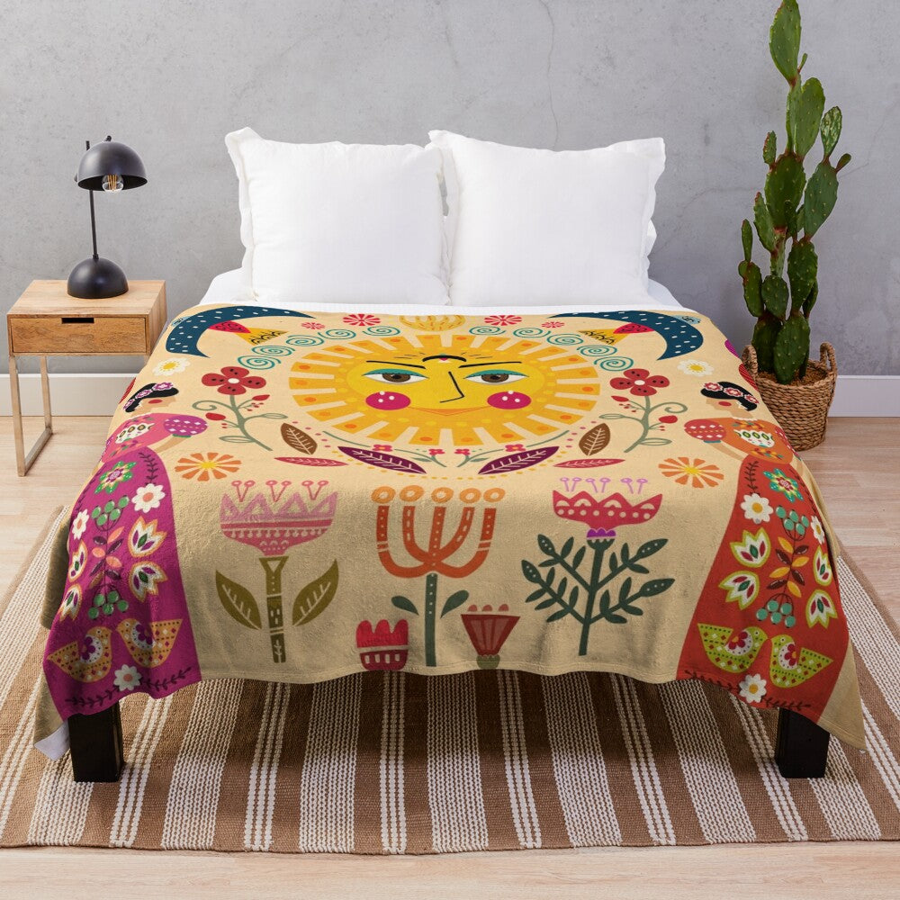 Colorful Frida Kahlo inspired plush blanket with floral and folk art designs